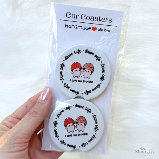 set of 2 car coasters with two mushrooms that says drive safe i love you so mush