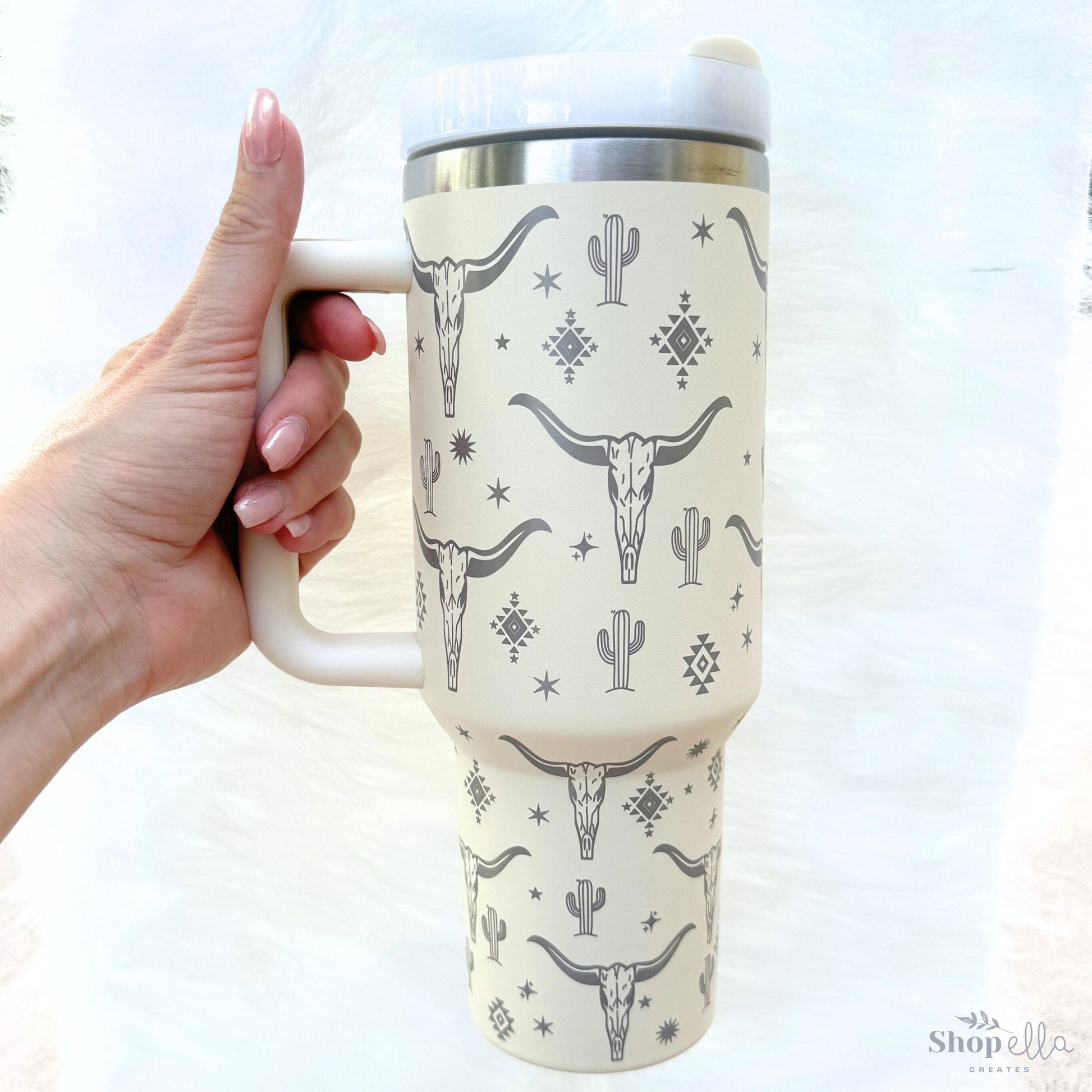 40oz engraved double walled insulated stainless steel tumbler with western bull longhorn skulls and cactus and aztec pattern